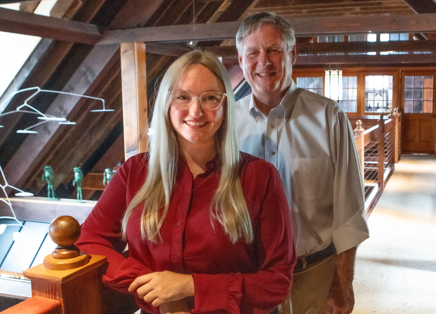 Attorneys Amanda Blum and Mark Multerer standing in an office loft