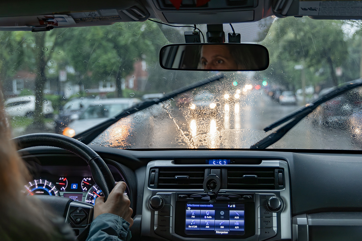 Women driving in wet conditions. | Fall Driving Tip #8: How to get out of a skid.